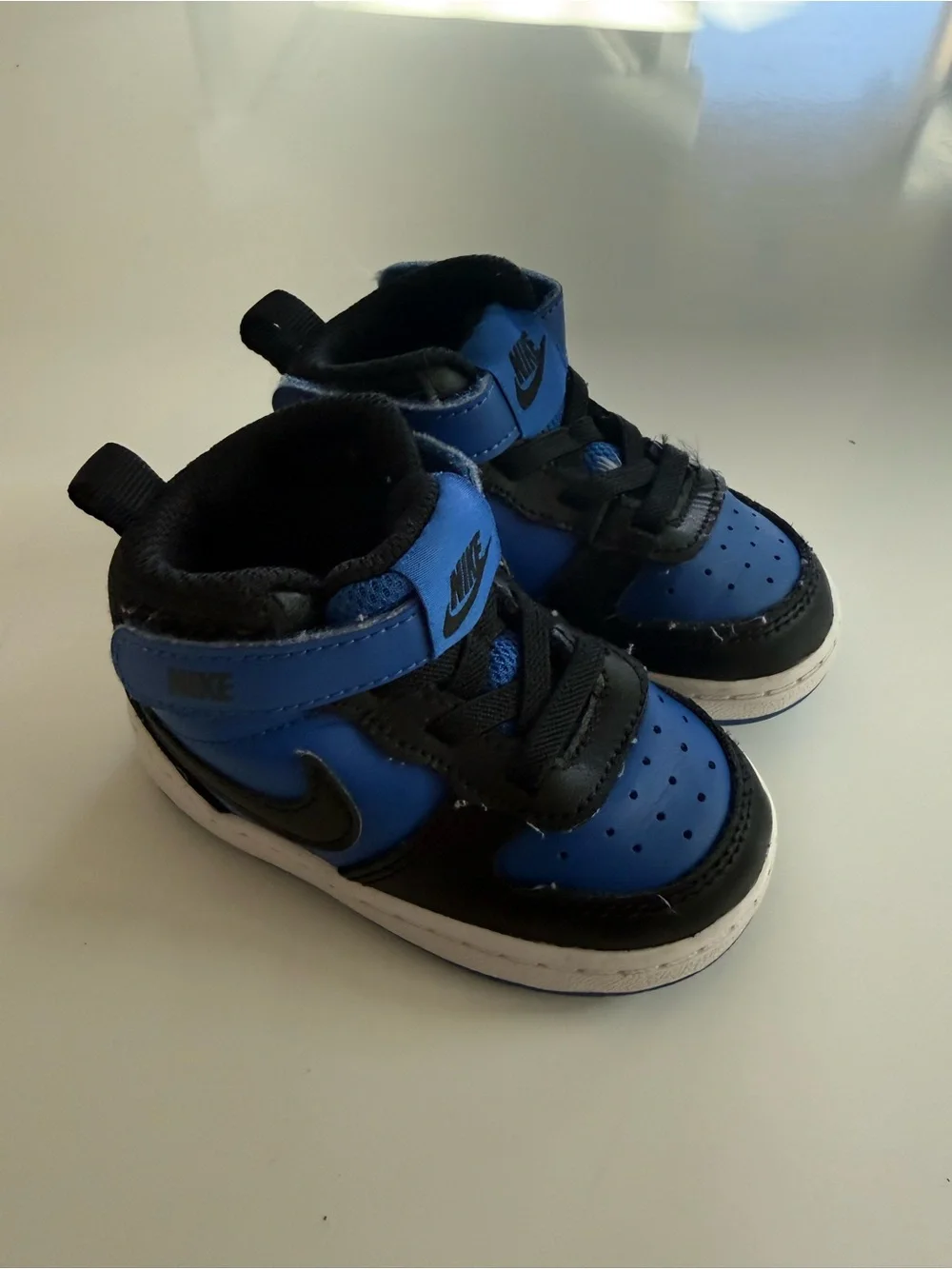 Nike Toddler Black and Blue High-Top Sneakers